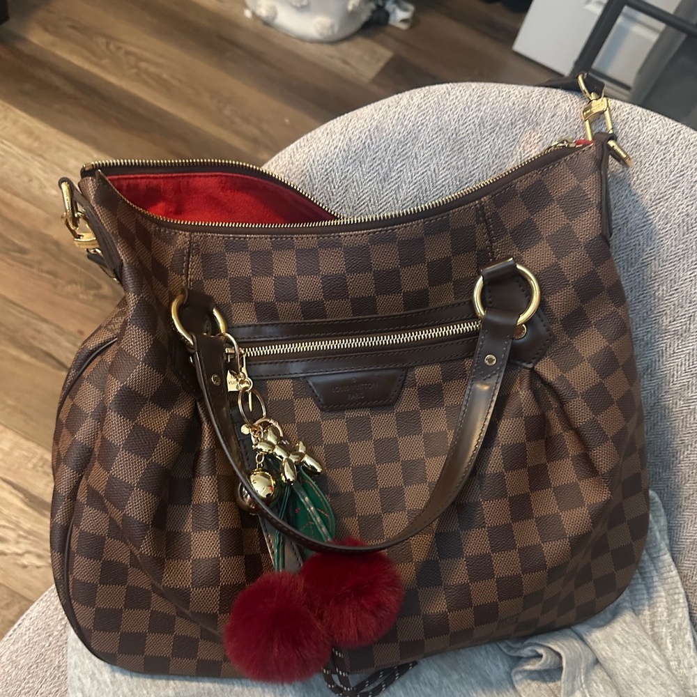 Louis Vuitton Evora MM Bag